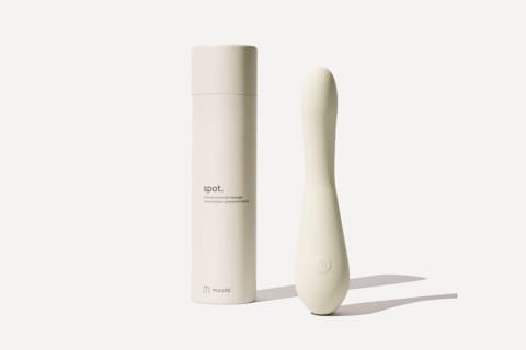 maude spot vibrator standing up right next to recycled packaging