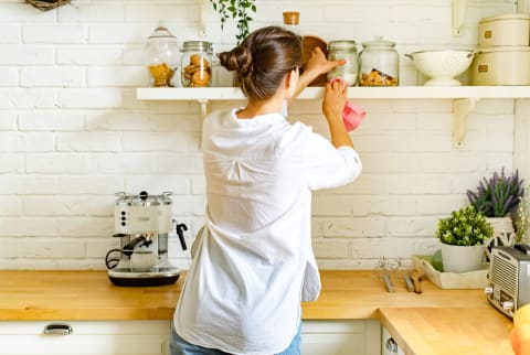 Woman Cleaning Her Kitchen