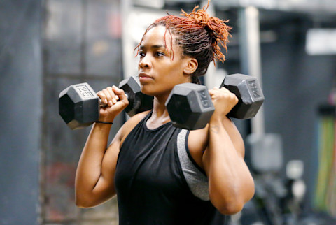Woman lifting weights Woman lifting weights
