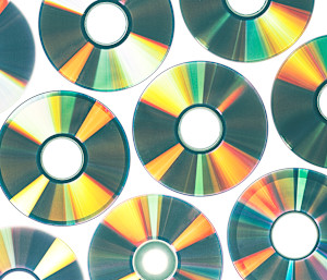 Easy Ways To Recycle Old CDs & DVDs (Because Trashing Them Is A No-No)