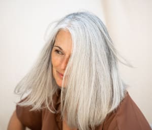 The Top Tips & Best Shampoos For Healthy Graying Locks, From Experts