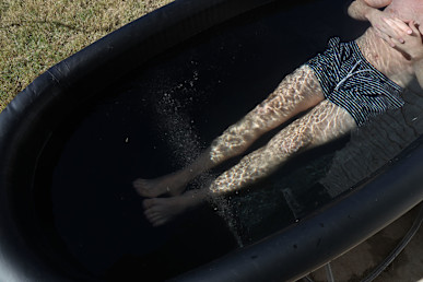 sun home portable tub close up of person in tub with jets on