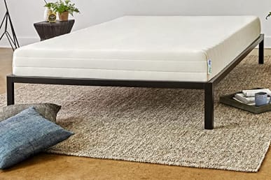 Latex mattress on bed frame