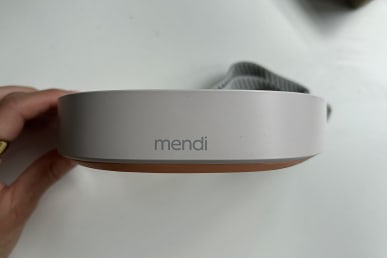 hand holding mendi headset