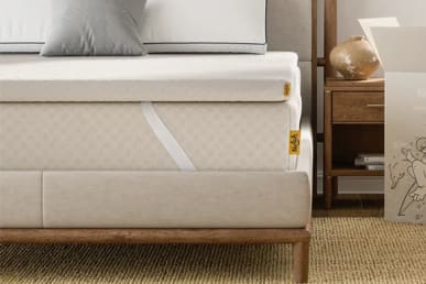 nolah mattress topper on bed in room