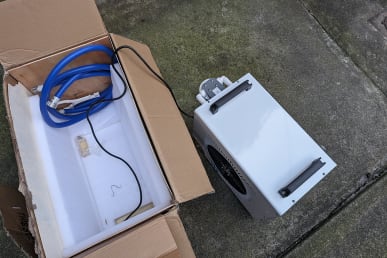 inergize health cold plunge chiller next to box