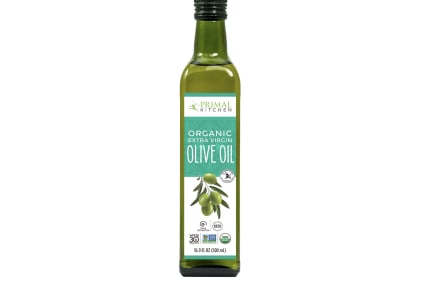 Premium Photo  Squeeze sauce bottle with fresh olive oil inside close up