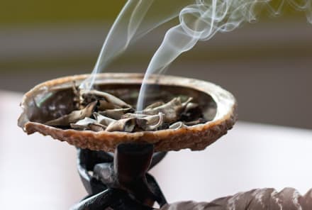 Smudging 101: Burning Sage To Cleanse Your Space & Self Of Negativity