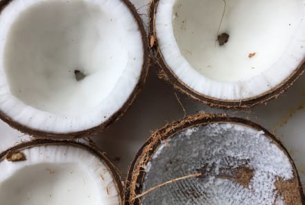 Why Coconut Oil Pulling May Be The Secret To Whiter Teeth & Better Digestion