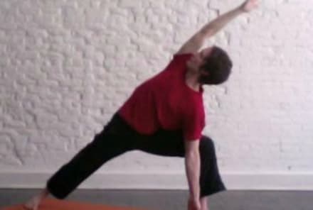 Yoga for Beginners: How to Do Extended Side Angle Pose with Michael Taylor (Video)