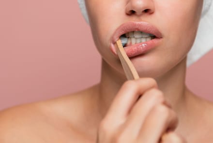 How To Whiten Your Teeth At Home & What To Avoid, From Dentists