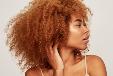 Considering Curly Bangs? We're Obsessed Too, But Read This First