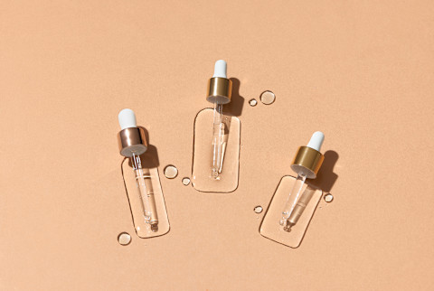 serum art shot on a tan background serum art shot on a tan background