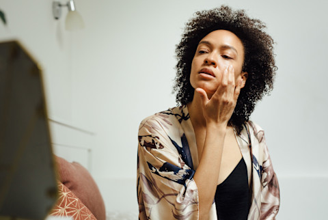 woman applying product woman applying product