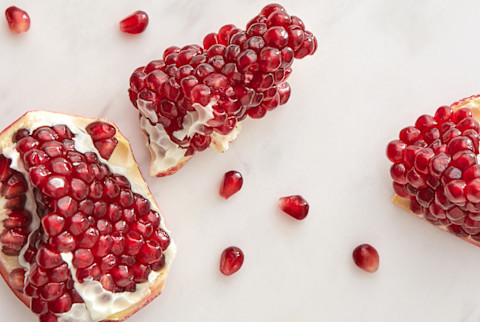 Slices Of Fresh Natural Juicy Pomegranate Fruit. Slices Of Fresh Natural Juicy Pomegranate Fruit.