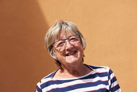 Smiling older woman with glasses