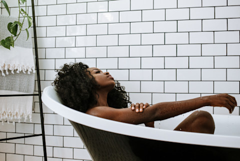 Woman Enjoying a Bath Woman Enjoying a Bath