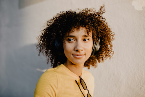 Woman Listening to Headphones Woman Listening to Headphones