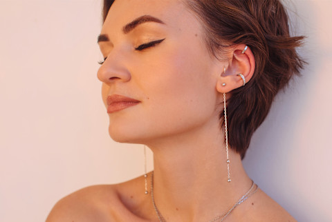 Daydreaming Woman With Silver Jewelry Daydreaming Woman With Silver Jewelry