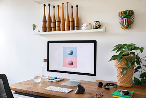 Work From Home  a computer with image in a styled home office