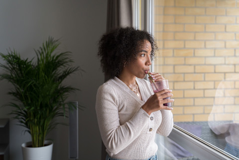 woman drinking smoothie woman drinking smoothie