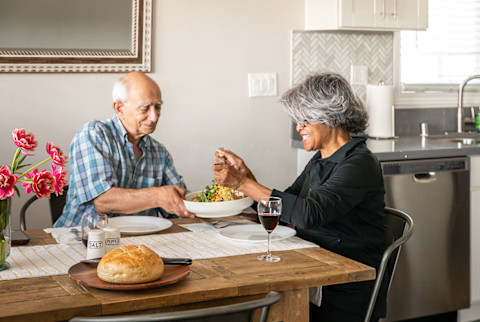 Older couple having dinner