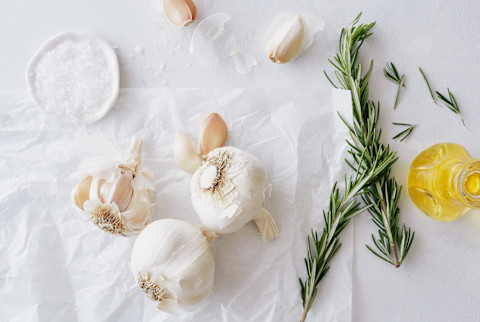 Garlic Rosemary And Olive Oil On Parchment