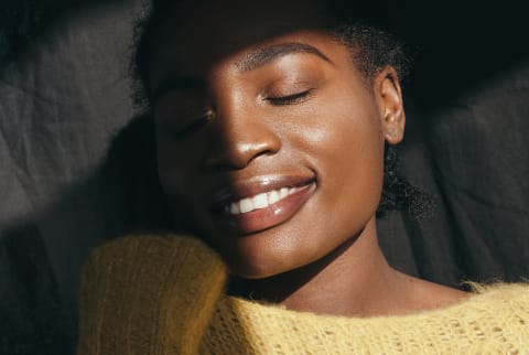 Beautiful Smiling Black Woman In Sunbeam