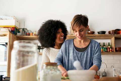Two women cooking Two women cooking