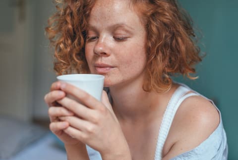 Woman with Coffee Mug