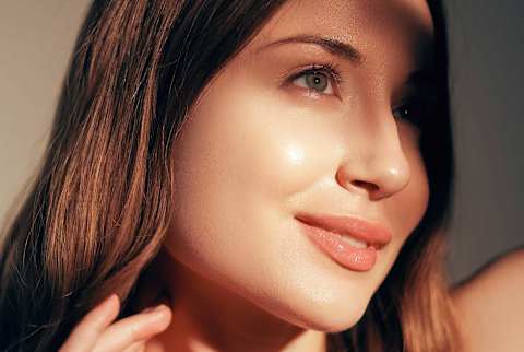 Beautiful Young Woman with glowing skin Beautiful Young Woman with glowing skin