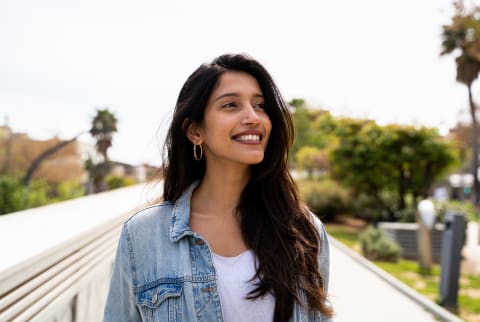 Woman smiling outside