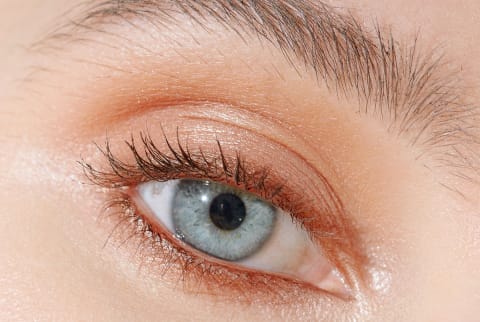 Closeup Shot of a Blue Eye with Soft Makeup