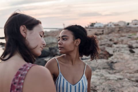 two women looking nostalgic