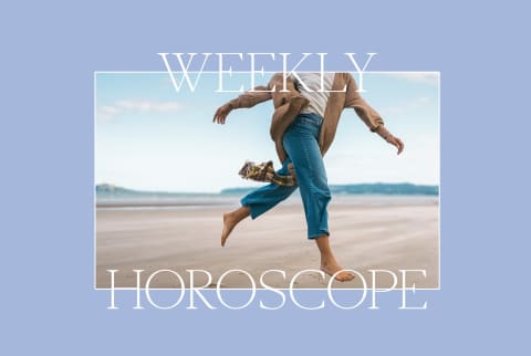 Anonymous woman leaps on the beach in jeans and a cardigan within Weekly Horoscope frame