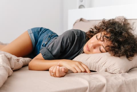  2/14/21) Young Woman Sleeping Peacefully On Bed