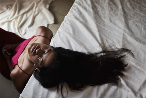 Tired Lonely Woman Sitting Near Bed