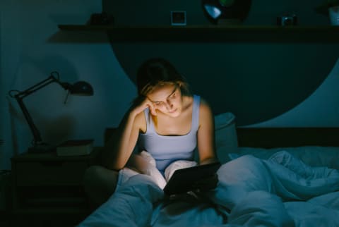 Teenager Up Late At Night Looking at a Screen