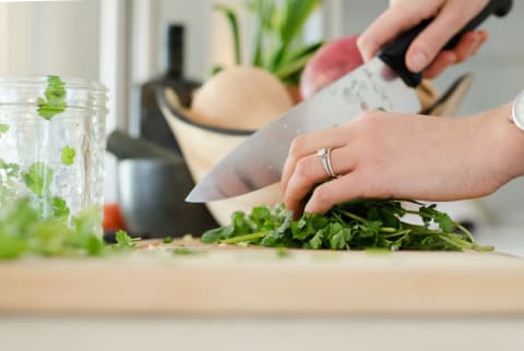 woman chopping vegetables