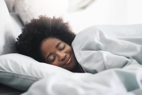 Woman sleeping in bed