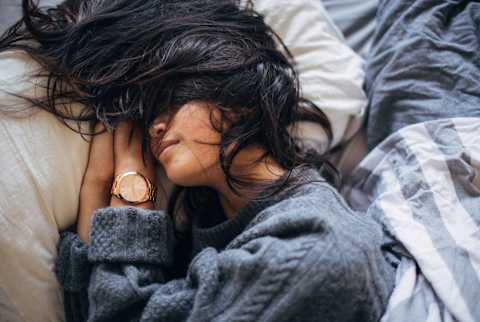 Young asian woman in bed sleeping