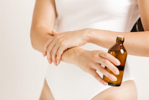 Portrait Of A Young Woman With Essential Oil