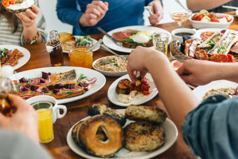 People Eating Breakfast At Home