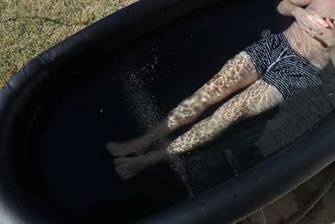 sun home portable tub close up of person in tub with jets on sun home portable tub close up of person in tub with jets on
