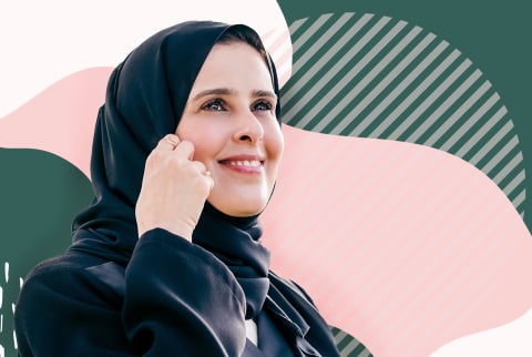 headshot of woman in hijab looking out into the distance