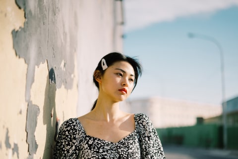 Thoughtful Young Woman Outdoors