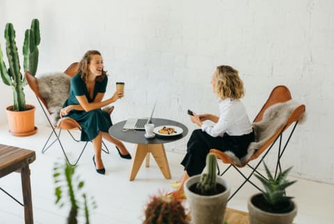 Women Chatting at Work