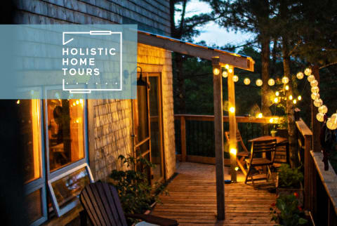 wood porch outside remote cabin with string lights