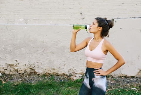 Athletic Woman Drinking Water