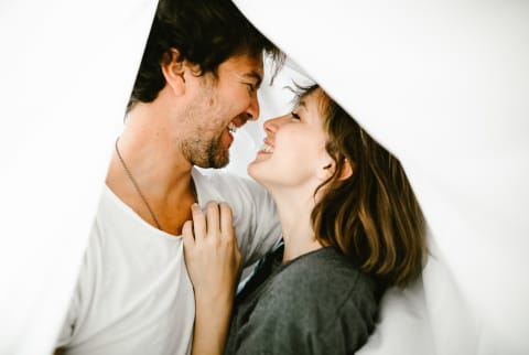 Couple Together in Bed